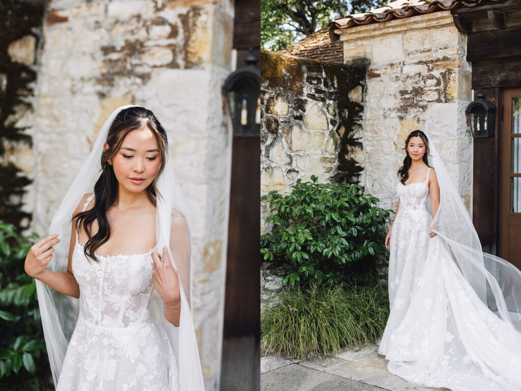 Bride wedding portrait in front of historic stone building at Holman Ranch, Carmel Valley, bride holding romantic floral bouquet.